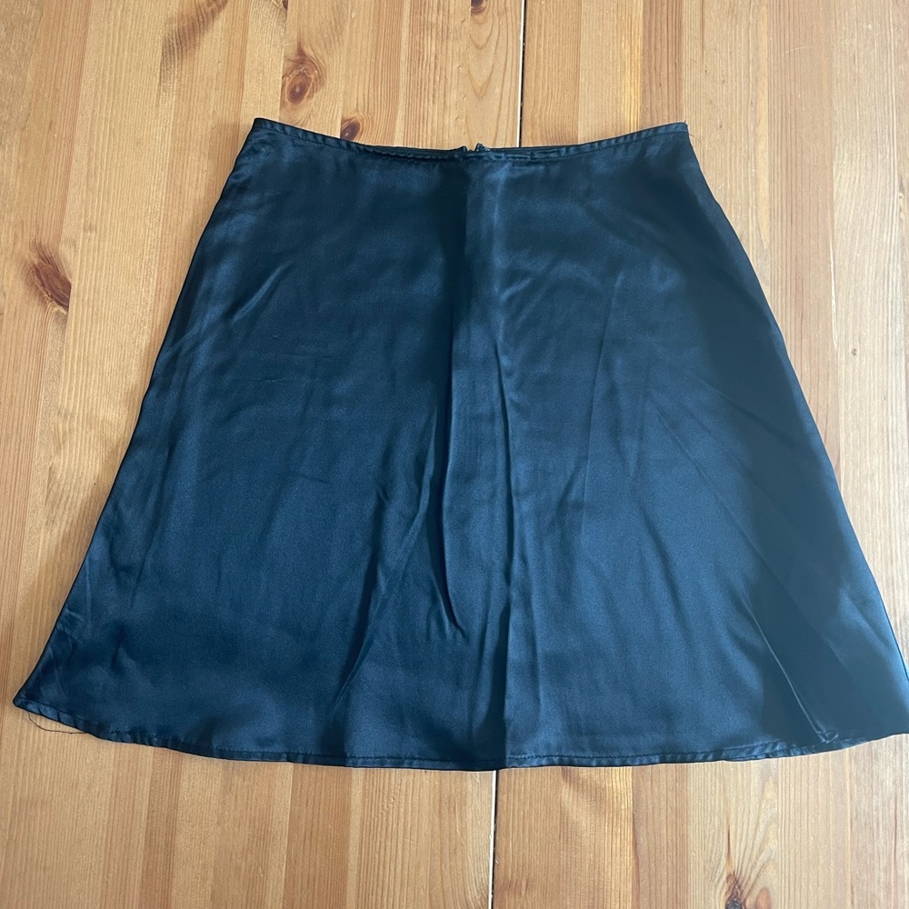 Reformation black 100% silk miniskirt in good condition, size 0